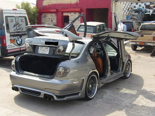 Illustration for article titled World's Most Hideous Nissan Maxima Found In Kuwait